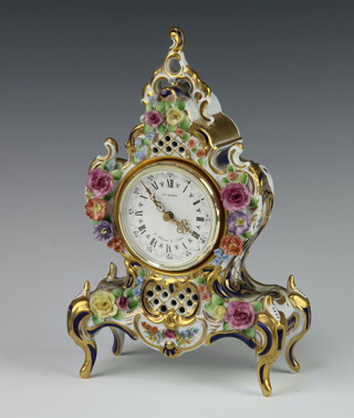A 20th Century Dresden Reine Handarbeit rococo style porcelain timepiece decorated with spring flowers 24cm 