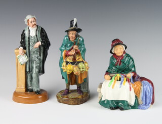 Three Royal Doulton figures - The Mask Seller HN2103 20cm, The Lawyer HN3041 21cm and Silks and Ribbons HN2017 16cm 
