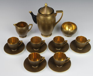 An Art Deco Carlton Ware black and gilt speckled coffee set comprising coffee pot, sugar bowl, 6 coffee cans, cream jug and saucers 