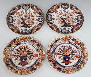 A pair of Royal Crown Derby Imari pattern plates decorated with flowers 22cm, a pair of ditto decorated with vases of flowers 22cm 