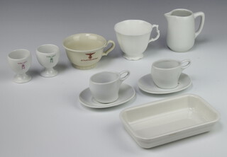 A quantity of Third Reich German white glazed table china comprising a Heinrich cream jug dated 1941, 2 coffee cups and saucers dated 1944, 2 egg cups, a tea cup, dish and tea cup 