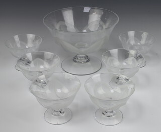 A moulded glass dessert service comprising pedestal fruit bowl and 6 pedestal bowls