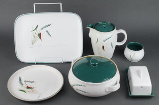 A Denby Greenwheat dinner service comprising 5 rectangular dishes, 2 section vegetable dish, an oval serving dish, a sauce boat, a butter dish and cover, a handled dish, a coffee pot and lid, 4 tureens and covers, 1 tureen (no cover), 2 bowls, 8 small plates, 5 side plates, 4 dinner plates, a rectangular meat plate 