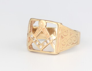 A gentleman's 9ct yellow gold pierced masonic signet ring size Q, 5.9 grams 