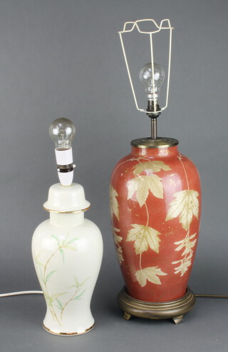 A Chinese ceramic pedestal table lamp decorated with leaves 39cm, a ditto decorated bamboo 31cm 