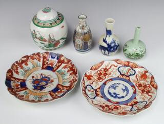 A famille verte ginger jar and cover decorated with figures and a gentleman fishing 13cm, a blue and white Chinese crackle glazed vase decorated with a horse 13cm, a late Celadon vase decorated with flowers 5cm, a Japanese bottle vase decorated with flowers 12cm and 2 Imari plates 22cm 
