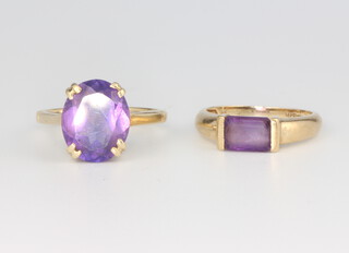 A 9ct yellow gold amethyst ring size J, ditto size N, 5.8 grams 