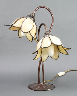 A Libertys style bronze twin light table lamp in the form of 2 flower heads, raised on a lily shaped base 46cm h x 15cm  