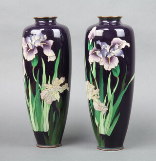 A handsome pair of Japanese black ground cloisonne enamel vases decorated orchids 30cm h x 6cm diam. 