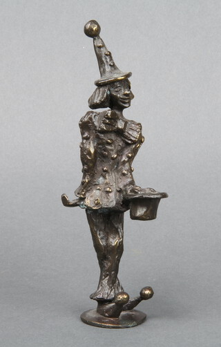 A bronze figure of a standing clown 17cm h x 3cm 