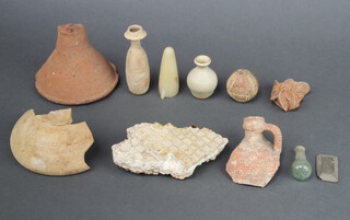 A collection of Roman and later shards of pottery etc 