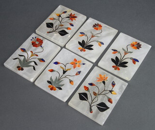 Six Indian rectangular specimen marble coasters with floral decoration 10cm x 7.5cm 