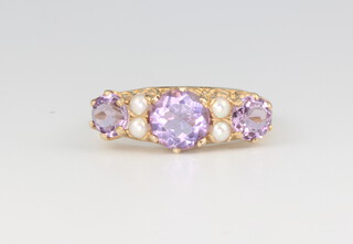 A 9ct yellow gold amethyst and seed pearl Victorian style ring 3.1 grams, size Q 