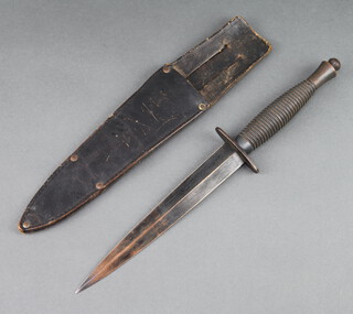 A reproduction fairbairn sykes fighting dagger with 17.5cm blade (blade bent) 