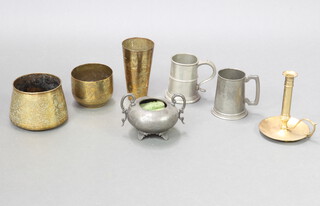 An Eastern engraved waisted beaker decorated a tree and figure 18cm x 10cm, a  Benares brass jardiniere 11cm x 14cm, 1 other 10cm x 13cm, a Best English pewter pint tankard, ditto Trafalgar Pewter, Britannia metal twin handled sugar bowl and a brass chamber stick 
