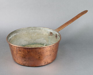 A copper saucepan marked SG 13cm h x 30cm diam. 