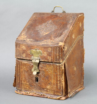 An 18th Century leather covered, wedge shaped, stationery box with fitted interior 28cm x 29cm x 16cm  