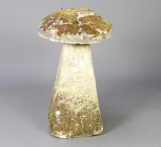 A well weathered staddle stone of mushroom form the base 70cm h x 41cm w x 36cm d, diameter of staddle stone 52cm diam. 