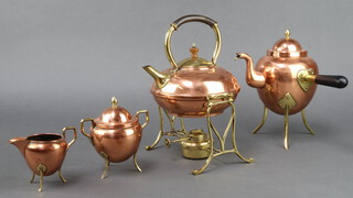 An Art Nouveau copper and brass tea kettle and burner 29cm h x 18cm w x 14cm d together with a similar copper and brass side handled coffee pot, lidded sugar bowl and cream jug  