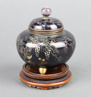 A black ground Japanese cloisonne jar and cover of melon form decorated birds amidst branches, raised on 3 bun feet and with detachable liner 7cm x 7cm 