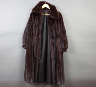A lady's full length mink coat by Charles Moss 