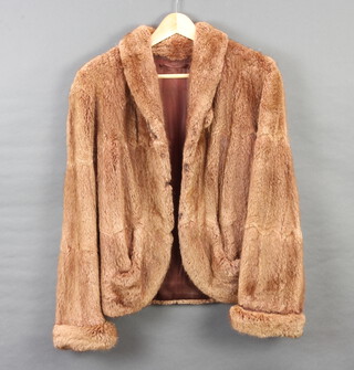 A light mink quarter length fur jacket  