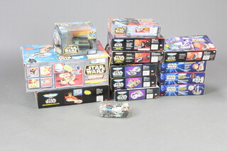 A collection of 13 Micro Machines Star Wars playsets and models to include Double Takes Death Star, Millennium Falcon, Endor, Gungan Sub/Otoh Gunga, Stormtrooper/The Death Star, Tie Bomber, Ice Planet Hoth, The Death Star, Jar Jar Binks/Naboo, Vader's Lightsaber/Death Star Trench, Tie Fighter Pilot/Academy, Darth Maul/Theed Generator and Darth Vader/Bespin.