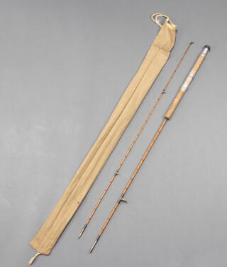 An Allcocks light caster 7'6" two piece split cane spinning fishing rod in original cloth bag 