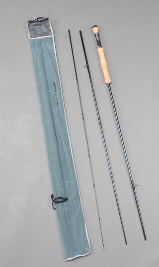 A Grey GRX 9'6" three piece fly fishing rod with 6/7 line weight, in original bag 
