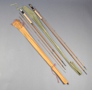 A Henry of Murton 9' three piece split cane fishing rod in original bag together with a similar 8'6" two piece split cane rod in cloth bag
