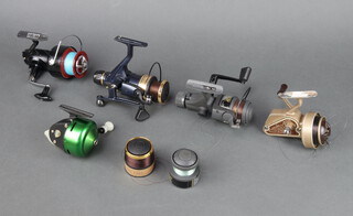 An Abu-Maic 30 fishing reel, an Ambidex no.1 reel, an Anom-Shaw Mk2 reel, a Shakespeare Ardent GLX reel with spare spool and a Target XR reel and spool 