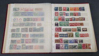 A red stock book containing British Commonwealth stamps Victoria to Elizabeth II mint and used, Aiden to Falkland Islands (Stanley Gibbons catalogue 6,500 pounds) 