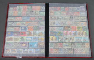 A stock book of British Commonwealth stamps George VI to Elizabeth II 
