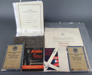 A Third Reich German certificate together with other German certificates, a Third Reich German pamphlet, map and leaflet "In Germany you must keep right" 
