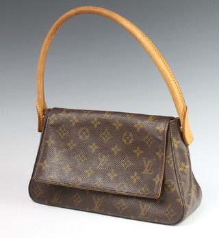 Louis Vuitton, a lady's handbag, the interior marked Louis Vuitton Paris, Made in France 15cm h x 28cm w x 8cm d, with cloth dust bag 