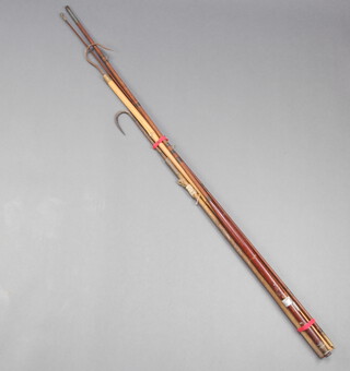 An early Hardy 10' salmon fly fishing rod with wooden handle, together with 2 Victorian gaffs 