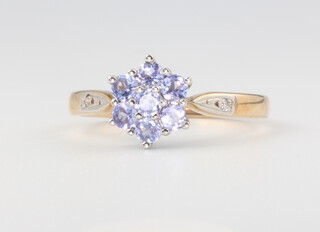 A 9ct yellow gold tanzanite and diamond cluster ring 2.7 grams, size P 
