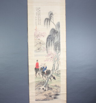 Chinese, early 20th Century hanging scroll, pen and wash depicting two figures on oxen, one playing a flute, the other carrying a branch beneath trees with 2 character mark and script with wooden ends 168cm x 45cm 