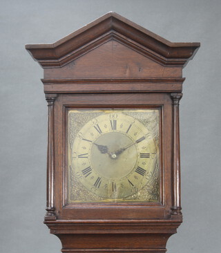 Tobias Gilks of Chipping Norton, a 30 hour longcase clock with birdcage movement, striking on bell, the 28cm brass dial with roman numerals and spandrels  , contained in an oak case complete with pendulum and weights, 219cm h x 39cm w x 21cm d 