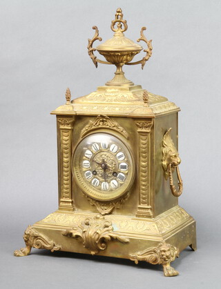 R. Dussopt Clermont Fd, a 19th Century French 8 day striking on bell mantel clock contained in a gilt metal case surmounted by an urn, the back plate marked 687, 43cm h x 29cm w x 17cm d (no pendulum or key) 