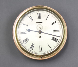 A ward room style clock with 24cm silvered dial and Roman numerals contained in a brass and light oak case with bracket, complete with key 11cm x 31cm 