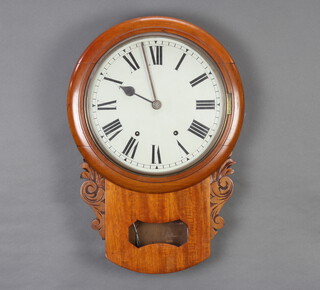 A Continental drop dial striking wall clock, the 30cm painted dial with Roman numerals, contained in a mahogany case with carved scrolls to the sides 56cm h x 39cm w 13cm d 