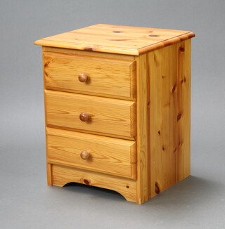 A pine chest of 3 drawers with tore handles 56cm h x 44cm w x 40cm d 