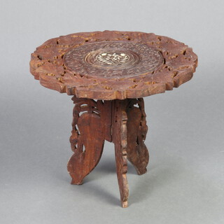 An Eastern carved and pierced hardwood table raised on a bobbin stand 31cm x 37cm 