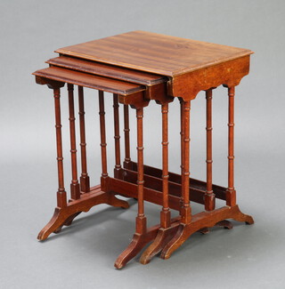 A nest of 3 rectangular Georgian style mahogany interfitting coffee tables, raised on turned supports 55cm h x 48cm w x 36cm d 