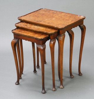 A nest of 3 Queen Anne style figured walnut interfitting coffee tables, raised on cabriole supports 57cm h x 50cm w x 38cm d 