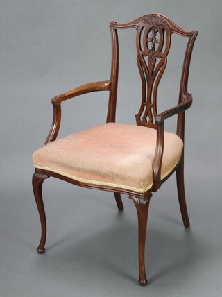 A Georgian style carved mahogany open arm carver chair with pierced vase shaped slat back, overstuffed seat, raised on cabriole supports 93cm h x 52cm w x 48cm d (1 arm is loose) 
