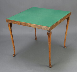 A beech framed folding bridge table with green baise top, 68cm x 76cm x 76cm 