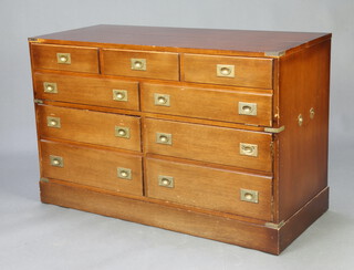 A mahogany military style chest, raised on a platform base and with brass countersunk handles and handles to the side 72cm h x 114cm w x 49 d (there is a split to the top and missing 1 handle to the side) 
