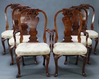 A set of 6 Queen Anne style figured walnut slat back dining chairs with over stuffed seats, raised on cabriole supports comprising 2 carvers 107cm h x 57cm w x 40cm d (seat 40cm x 36cm) and 4 standard chairs 106cm h x 50cm w x 45cm d (seat 39cm x 32, some contact marks to high points and some stains to the seats) These chairs were purchased at Harrods 